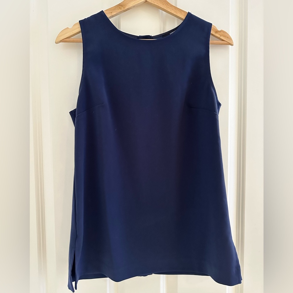 Blue work top with button-up back